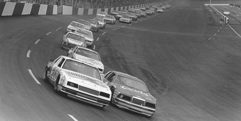 bill-elliott-and-david-pearson-lead-the-field-into-turn-one-news-photo-1589218641